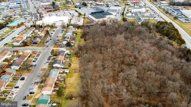 a view of residential houses with outdoor space