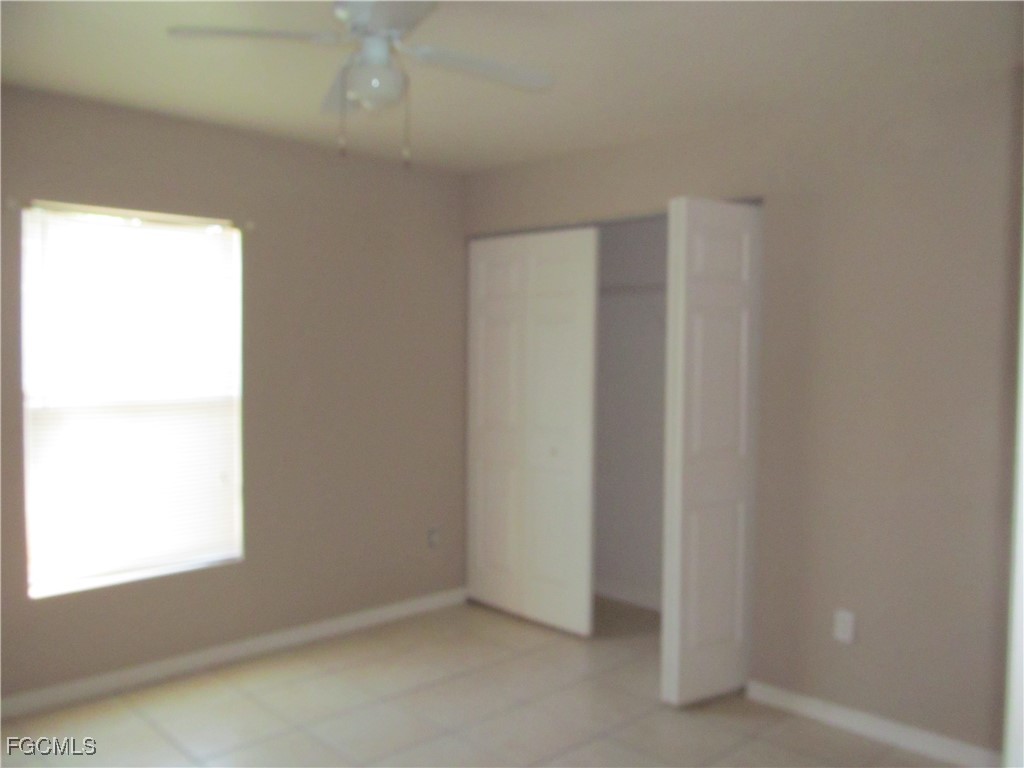 662 Alabama Road South Lehigh Acres, FL 33974 - Photo 5 of 11 a view of an empty room