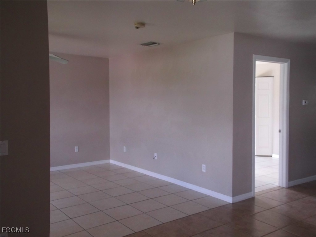 662 Alabama Road South Lehigh Acres, FL 33974 - Photo 10 of 11 a view of an empty room