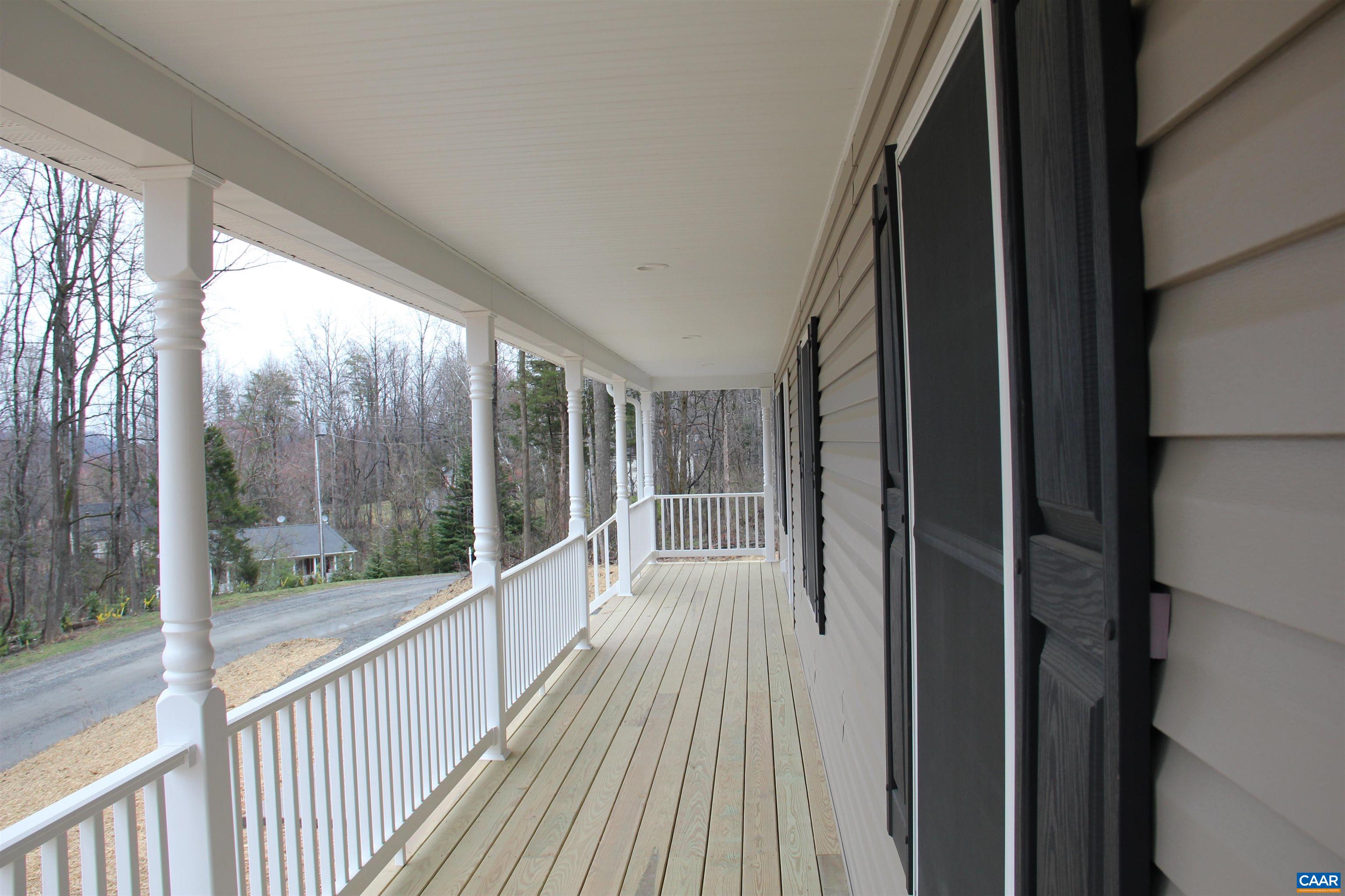 672 Westwood Road Stanardsville, VA 22973 - Photo 11 of 31 a view of a balcony with wooden floor