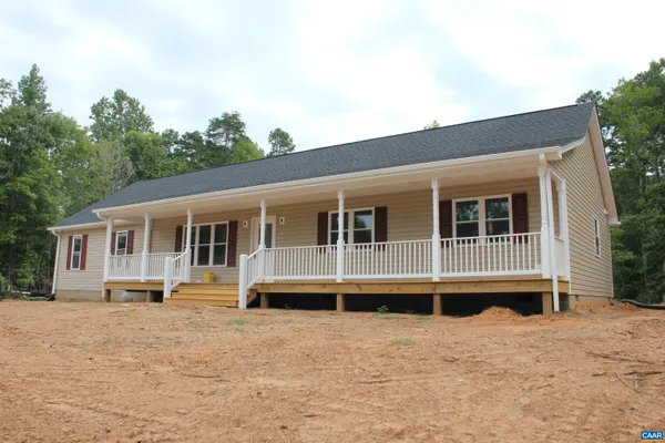 a house view with a backyard space