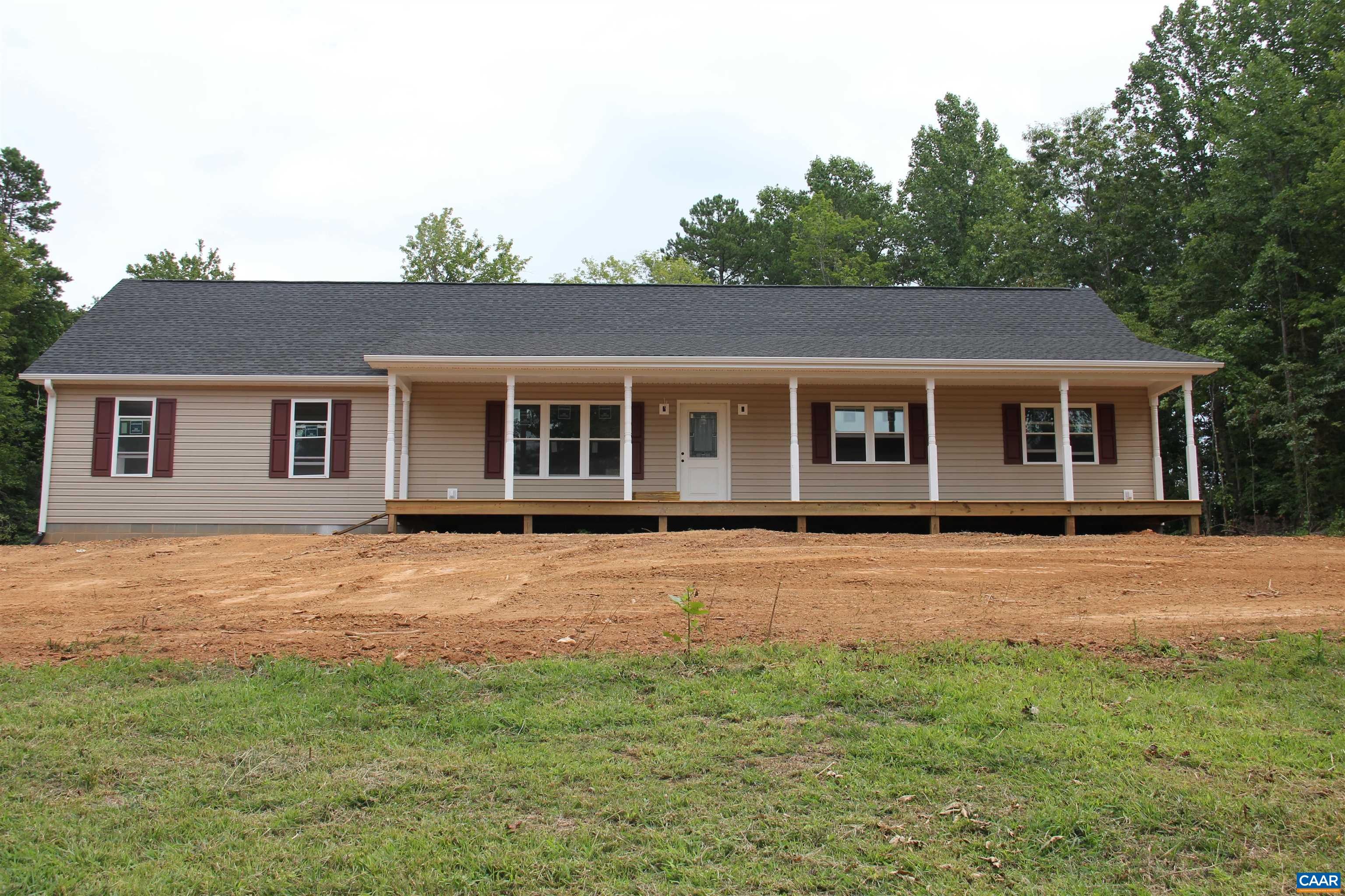 672 Westwood Road Stanardsville, VA 22973 - Photo 5 of 31 front view of a house with a garden