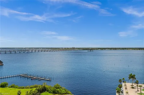 a view of a lake with a big yard