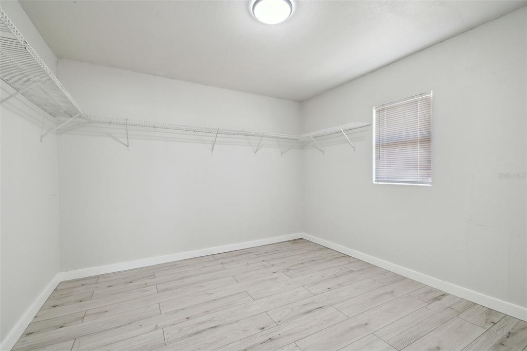 3414 Lindsey Street Dover, FL 33527 - Photo 29 of 45 wooden floor in an empty room