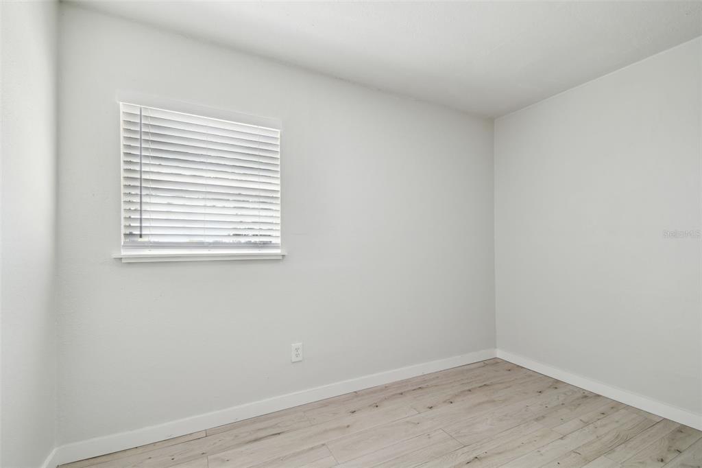 3414 Lindsey Street Dover, FL 33527 - Photo 38 of 45 a view of a small space with wooden floor and a window