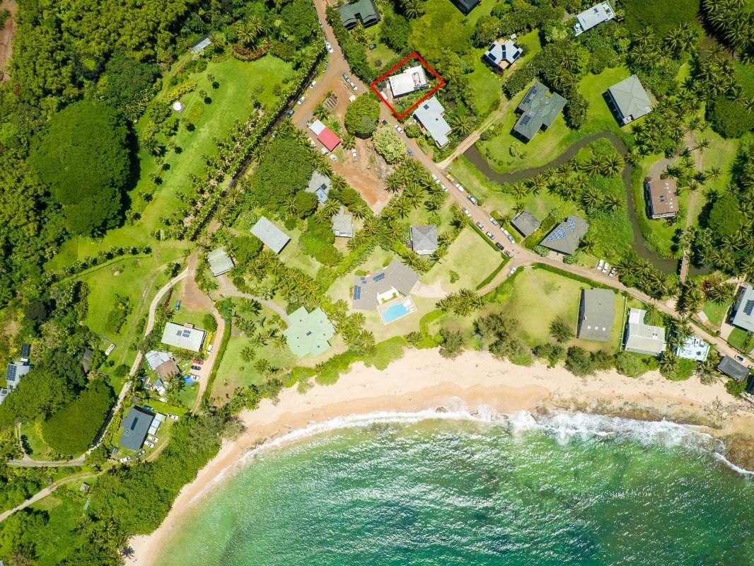 3590 Moloaa Road Kilauea, HI 96754 - Photo 22 of 22 a backyard of a house with lots of green space