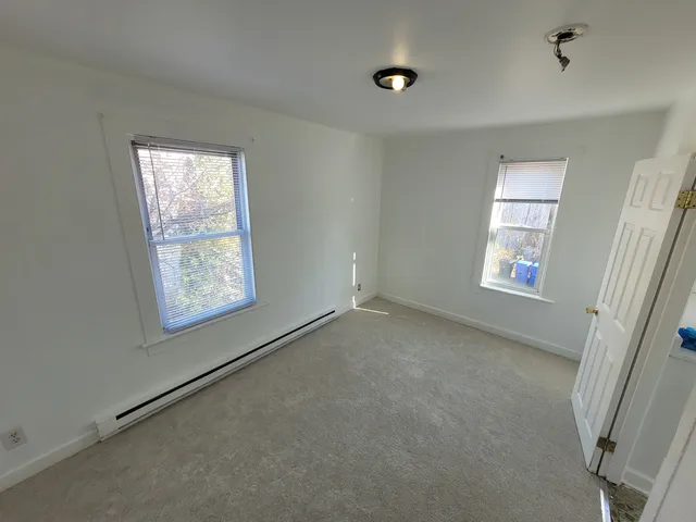 an empty room with windows