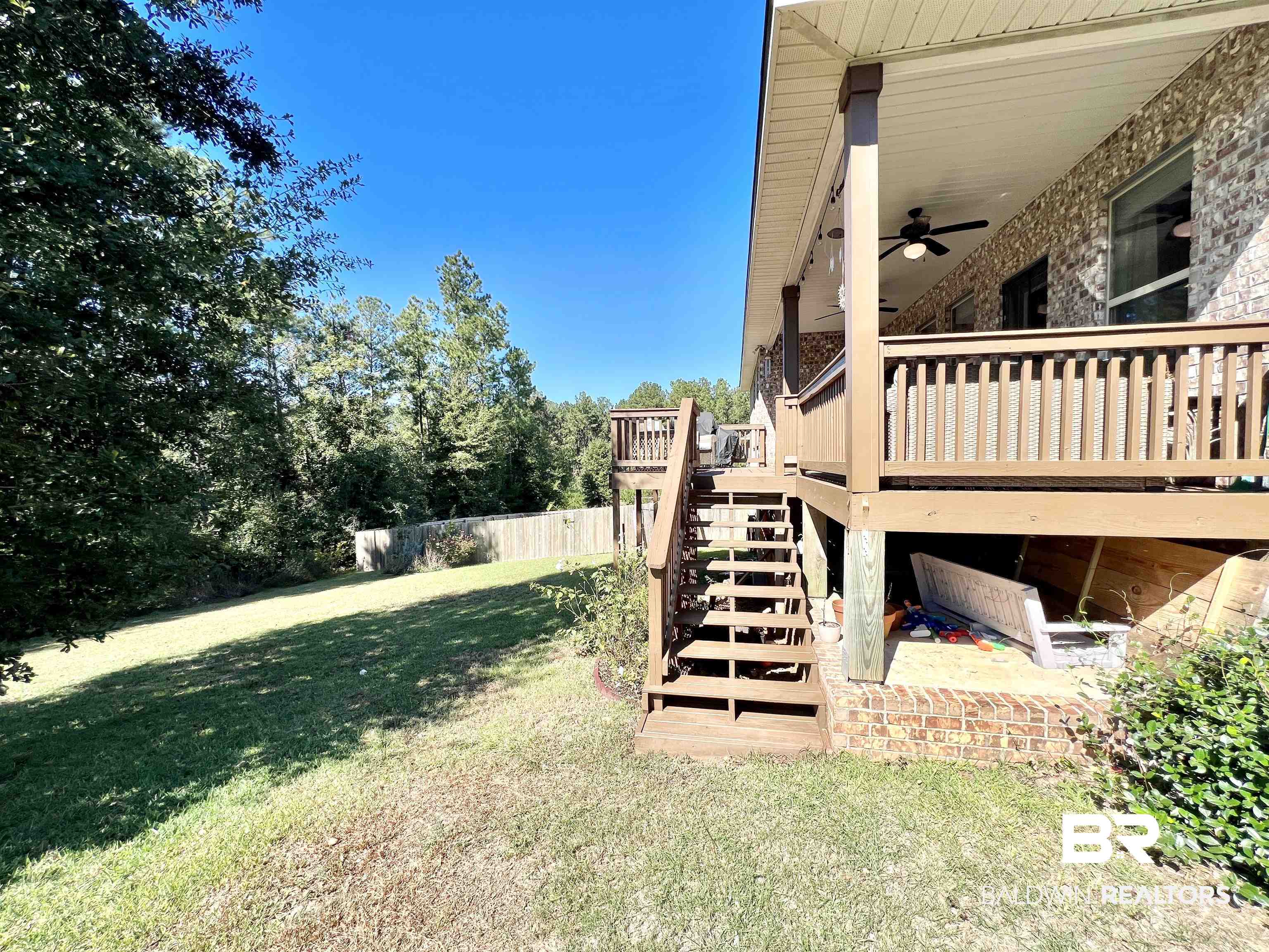 32290 Calder Court Daphne, AL 36527 - Photo 53 of 59 View of yard with a deck and ceiling fan