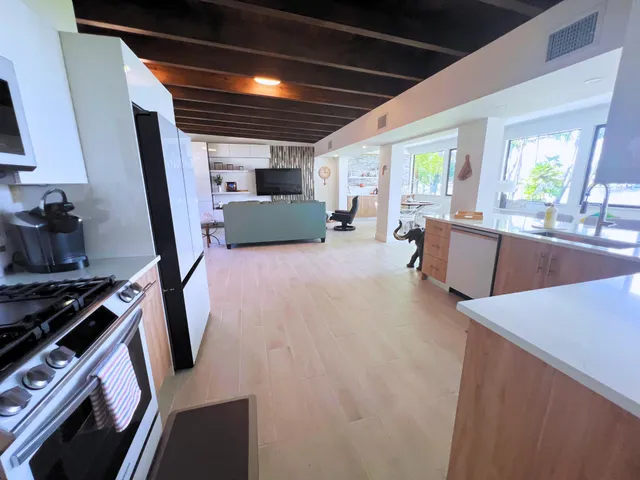 a bed room with furniture and a window