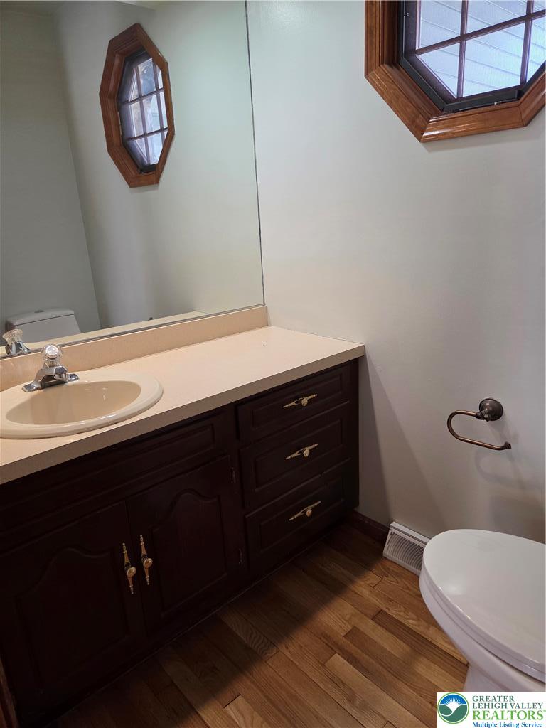 1728 Butztown Road, Unit C1 Bethlehem, PA 18017 - Photo 14 of 33 a bathroom with a toilet a sink and a mirror