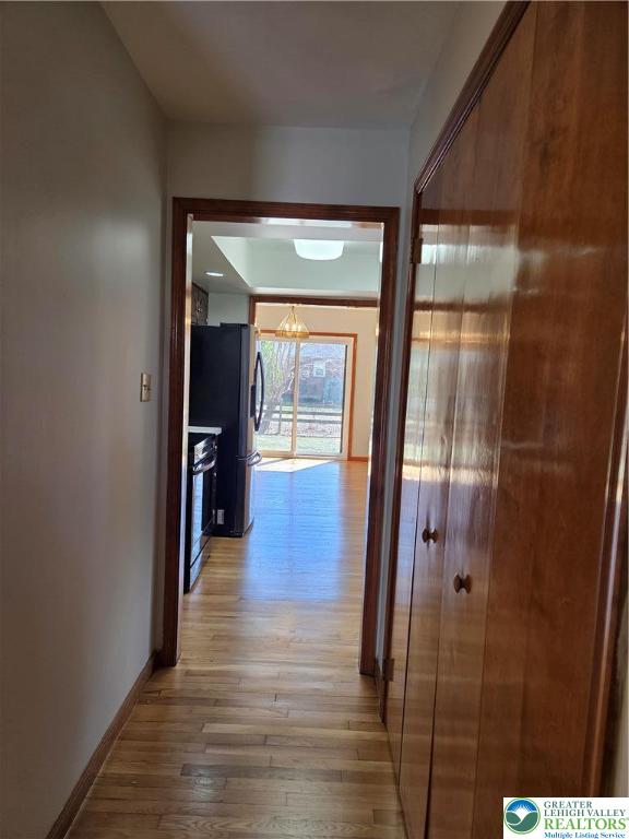 1728 Butztown Road, Unit C1 Bethlehem, PA 18017 - Photo 15 of 33 hall leading to the half bathroom, laundry room and galley kitchen