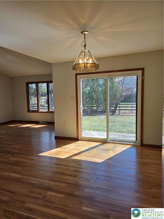 1728 Butztown Road, Unit C1 Bethlehem, PA 18017 - Photo 24 of 33 a view of empty room with wooden floor and fan