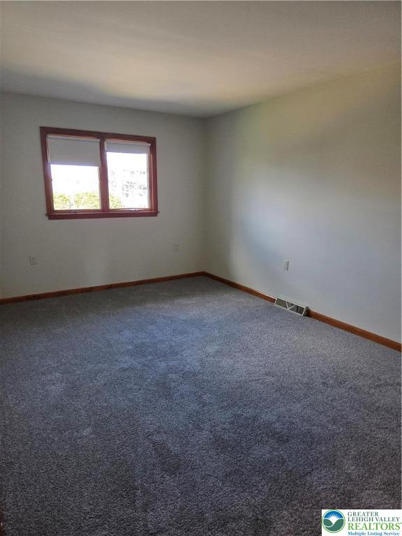 1728 Butztown Road, Unit C1 Bethlehem, PA 18017 - Photo 28 of 33 an empty room with a window