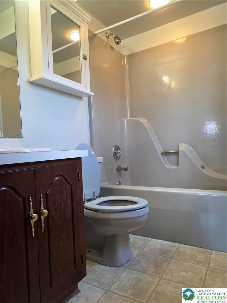 1728 Butztown Road, Unit C1 Bethlehem, PA 18017 - Photo 30 of 33 a bathroom with a sink a toilet and shower