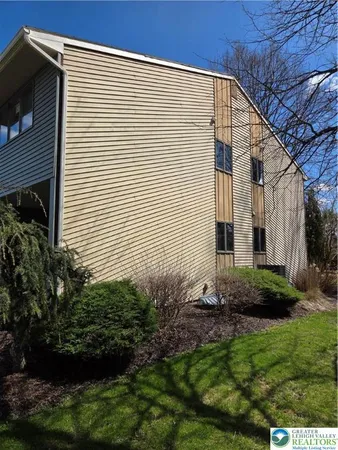 a view of a back yard of the house