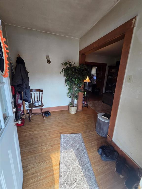313 Mercer Street Butler, PA 16001 - Photo 11 of 12 a living room with furniture and a wooden floor