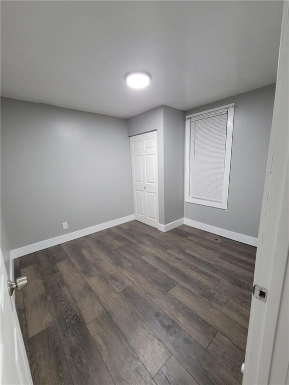 313 Mercer Street Butler, PA 16001 - Photo 7 of 12 a view of empty room with wooden floor and fan