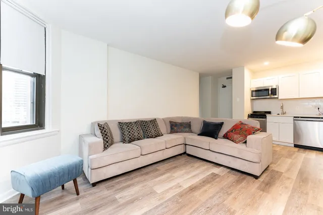 a living room with furniture and a couch