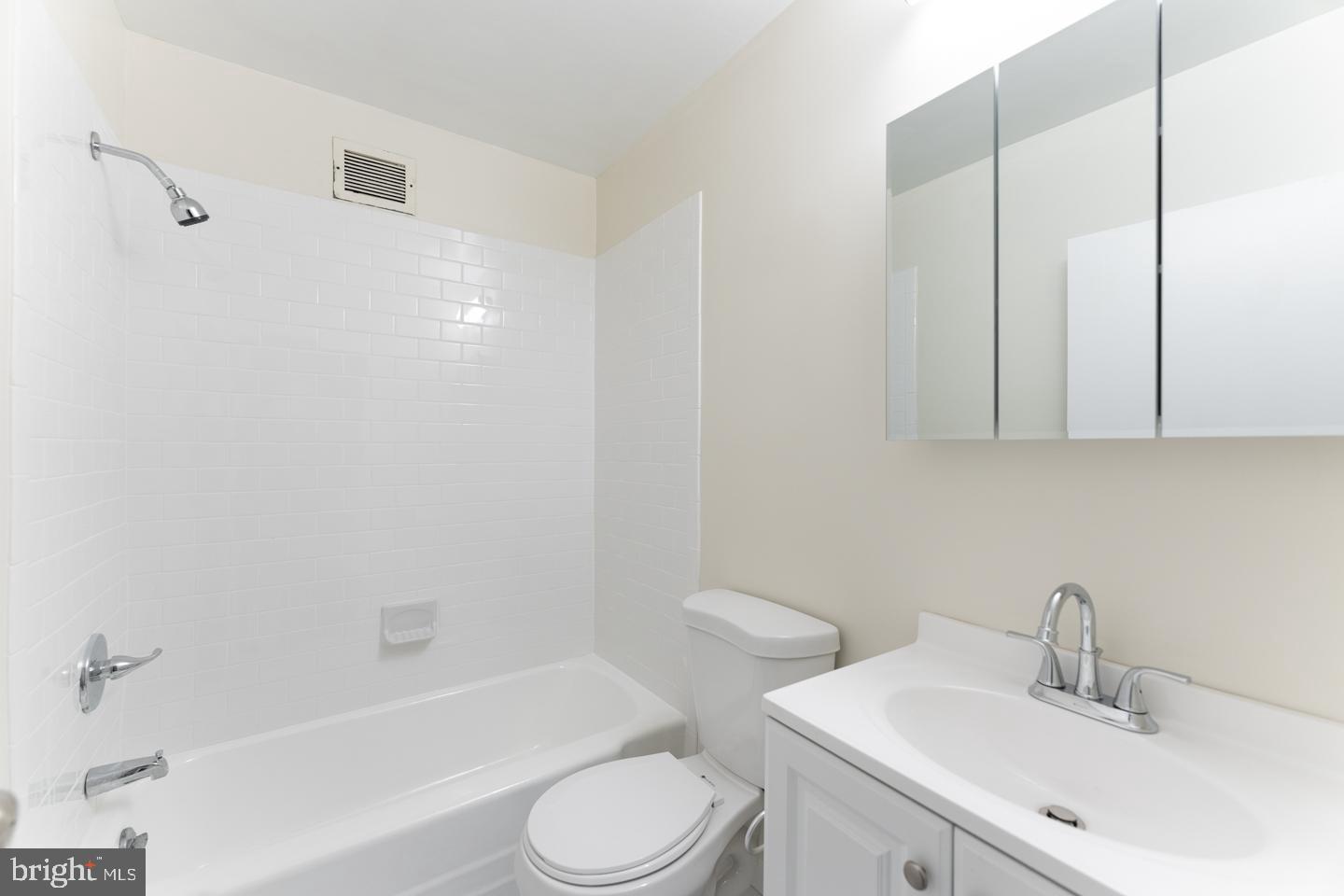 135 South 19th Street, Unit 707 Philadelphia, PA 19103 - Photo 8 of 14 a bathroom with a sink toilet and shower