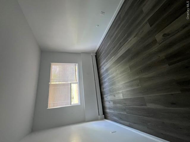 30 Tanager Road, Unit 3001 Monroe, NY 10950 - Photo 3 of 20 wooden floor in an empty room with a window