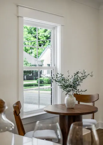 a view of a room with a table and chair
