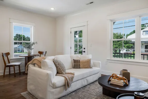 a living room with furniture and window