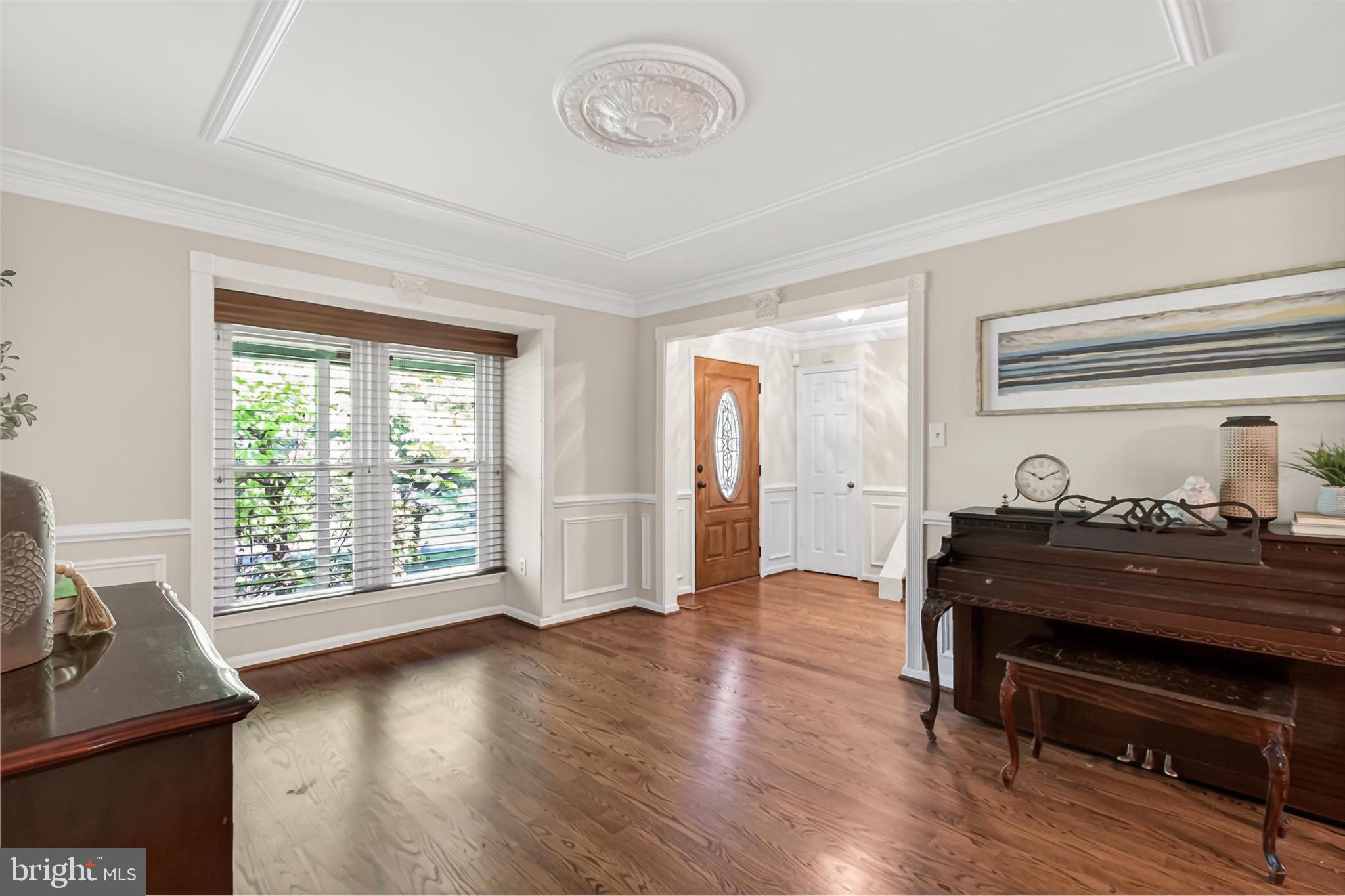 15117 Philip Lee Road Chantilly, VA 20151 - Photo 11 of 80 a living room with furniture and a window