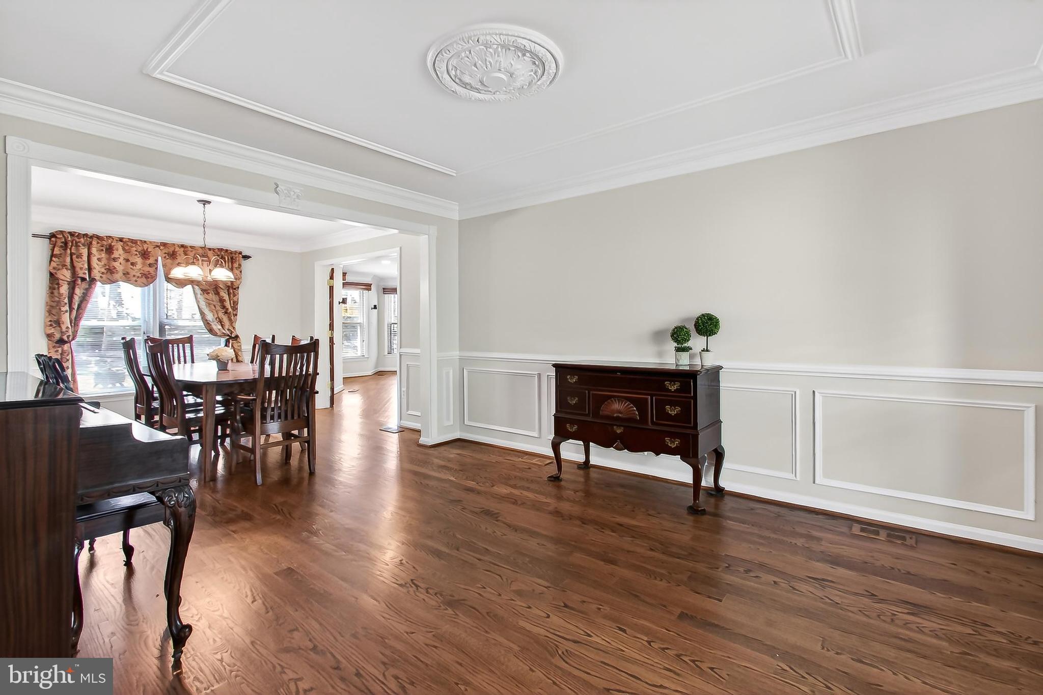 15117 Philip Lee Road Chantilly, VA 20151 - Photo 11 of 71 a workspace with furniture window and wooden floor