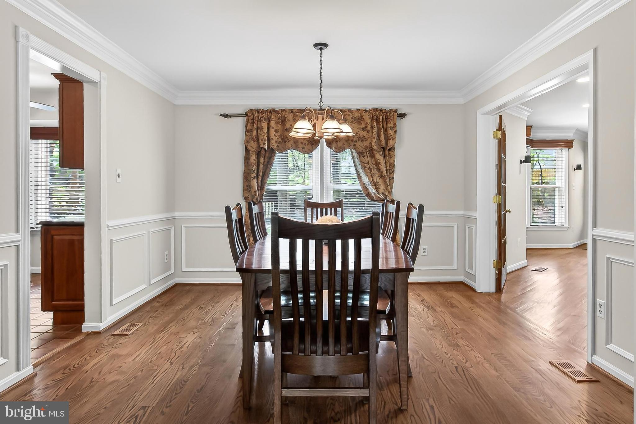 15117 Philip Lee Road Chantilly, VA 20151 - Photo 14 of 71 a view of a dining room with furniture window and wooden floor