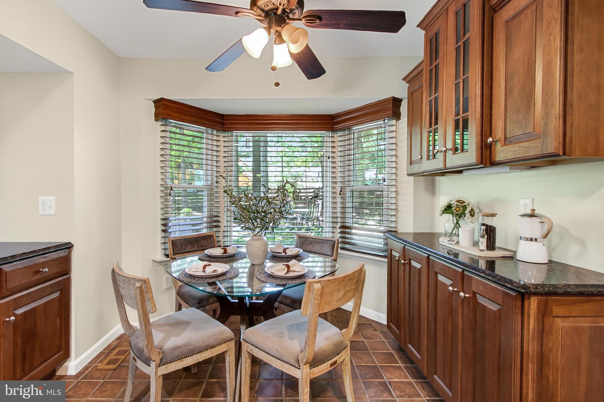 15117 Philip Lee Road Chantilly, VA 20151 - Photo 19 of 80 a dining room with furniture a chandelier and window
