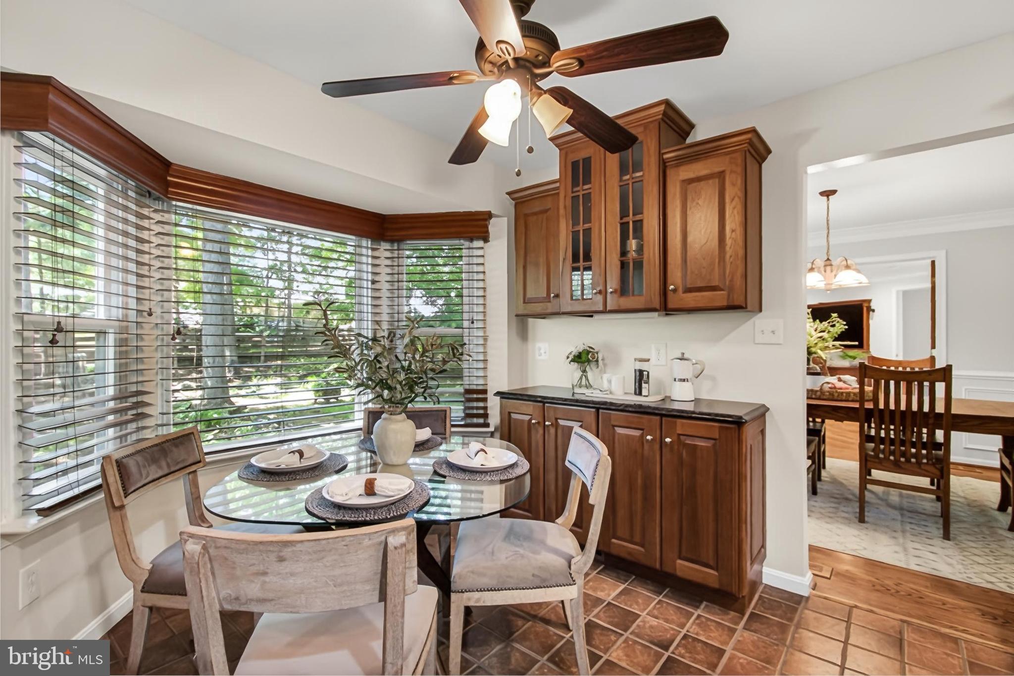 15117 Philip Lee Road Chantilly, VA 20151 - Photo 20 of 80 a view of a dining room with furniture window and outside view