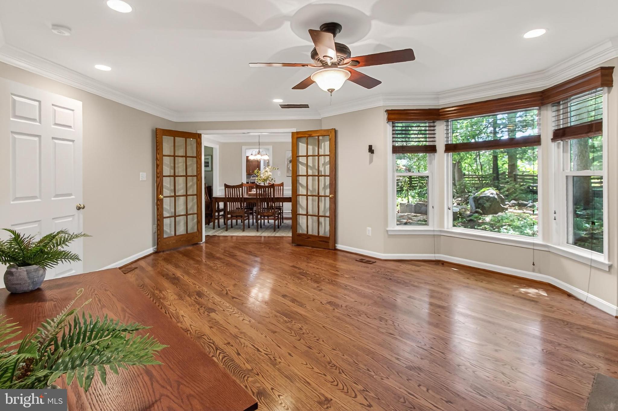 15117 Philip Lee Road Chantilly, VA 20151 - Photo 36 of 80 a view of empty room with wooden floor and fan