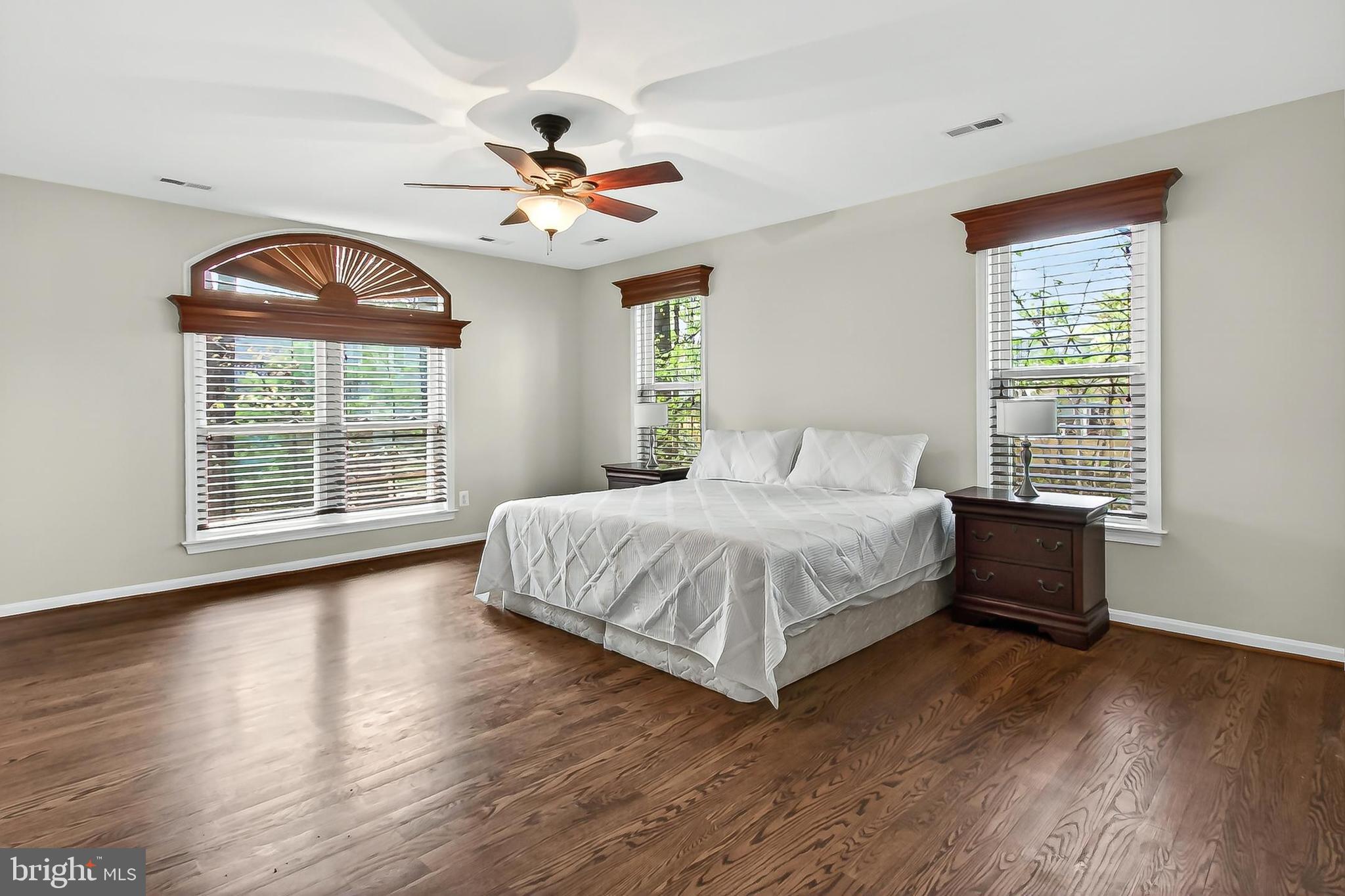 15117 Philip Lee Road Chantilly, VA 20151 - Photo 45 of 71 a bedroom with a large bed and a large window