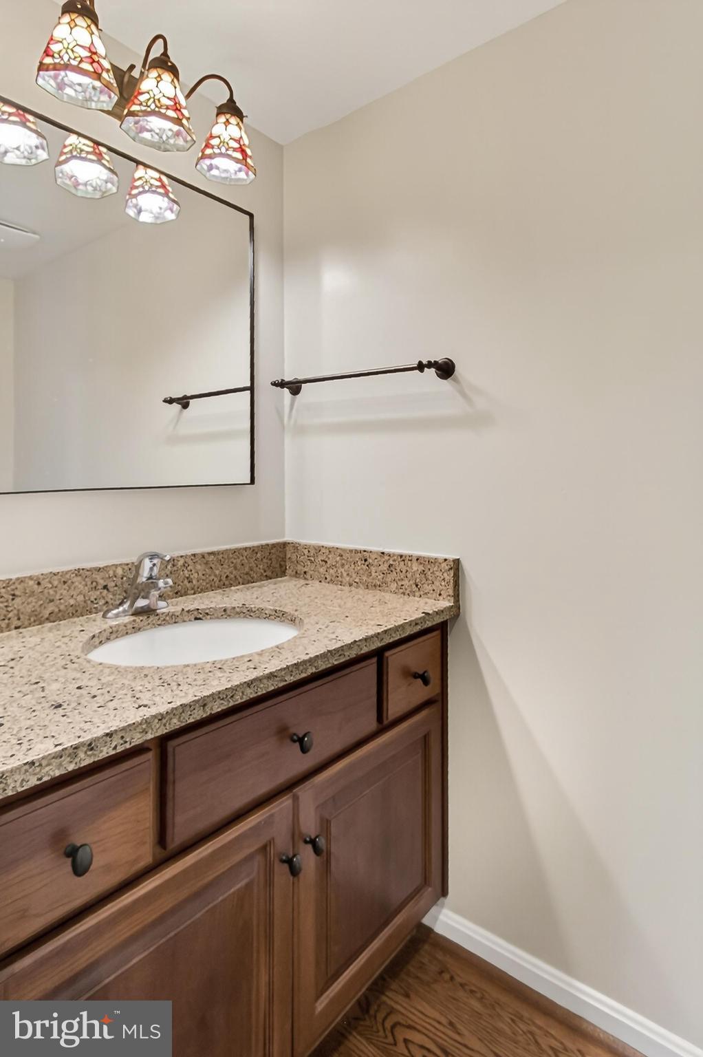 15117 Philip Lee Road Chantilly, VA 20151 - Photo 46 of 80 a bathroom with a sink and vanity