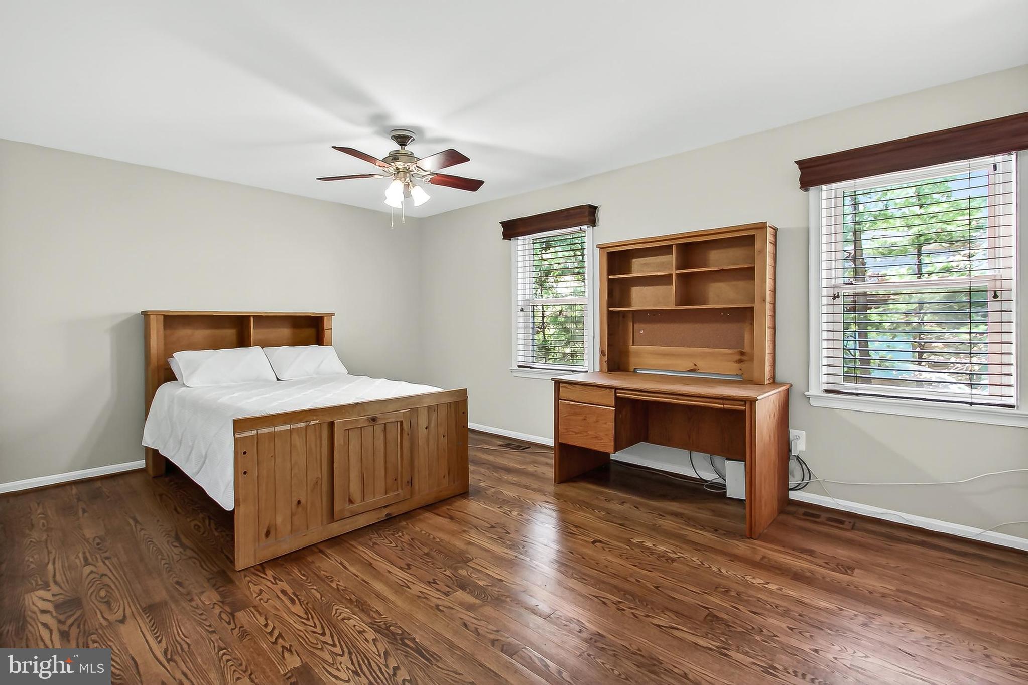 15117 Philip Lee Road Chantilly, VA 20151 - Photo 55 of 71 a bed room with a bed and a window