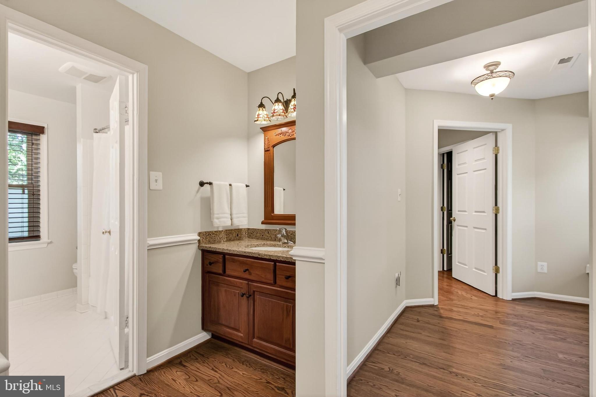 15117 Philip Lee Road Chantilly, VA 20151 - Photo 60 of 80 a view of a kitchen from the hallway