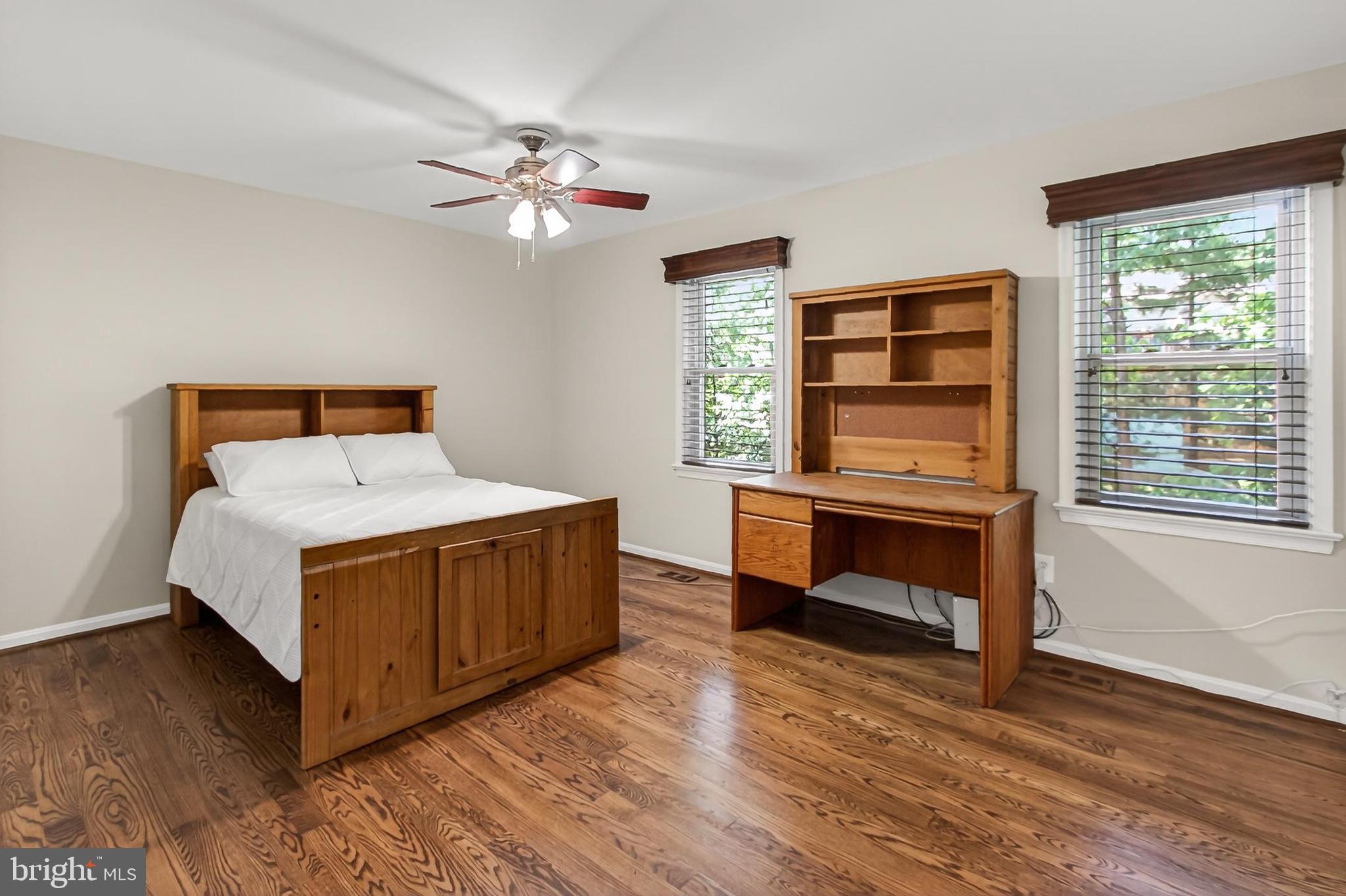 15117 Philip Lee Road Chantilly, VA 20151 - Photo 63 of 80 a bed room with a bed and a window