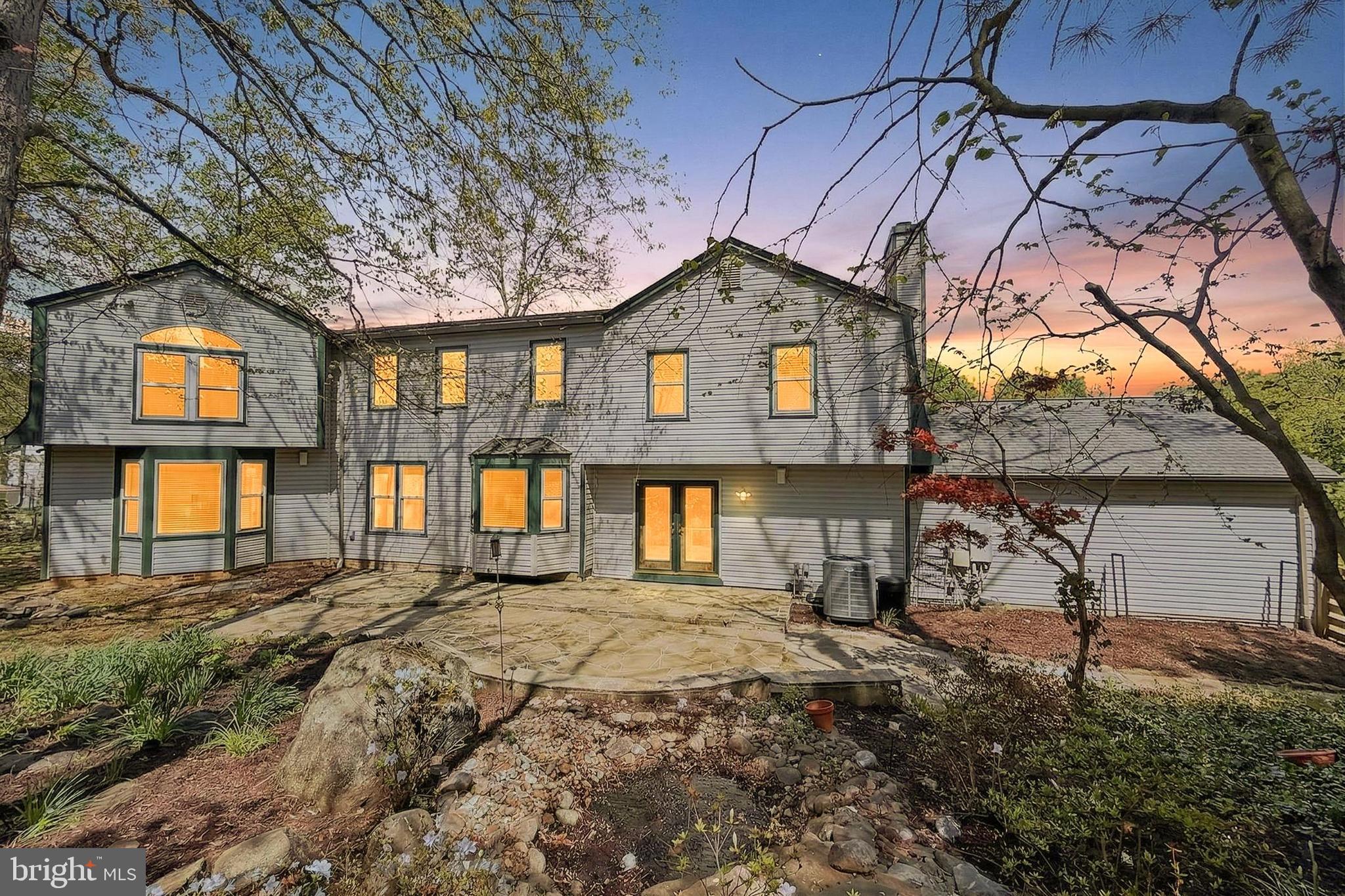 15117 Philip Lee Road Chantilly, VA 20151 - Photo 65 of 71 a front view of a house with a yard