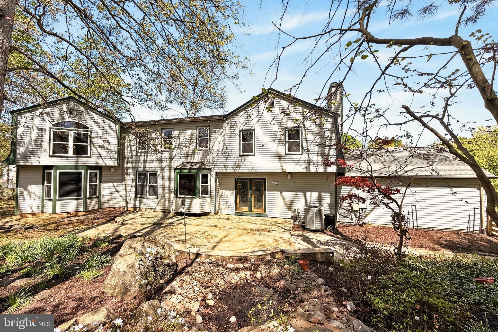 15117 Philip Lee Road Chantilly, VA 20151 - Photo 66 of 71 a front view of a house with a yard