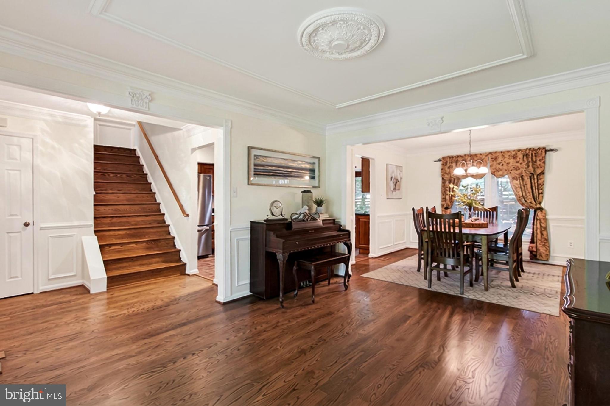 15117 Philip Lee Road Chantilly, VA 20151 - Photo 10 of 80 a view of a dining room with furniture window and wooden floor