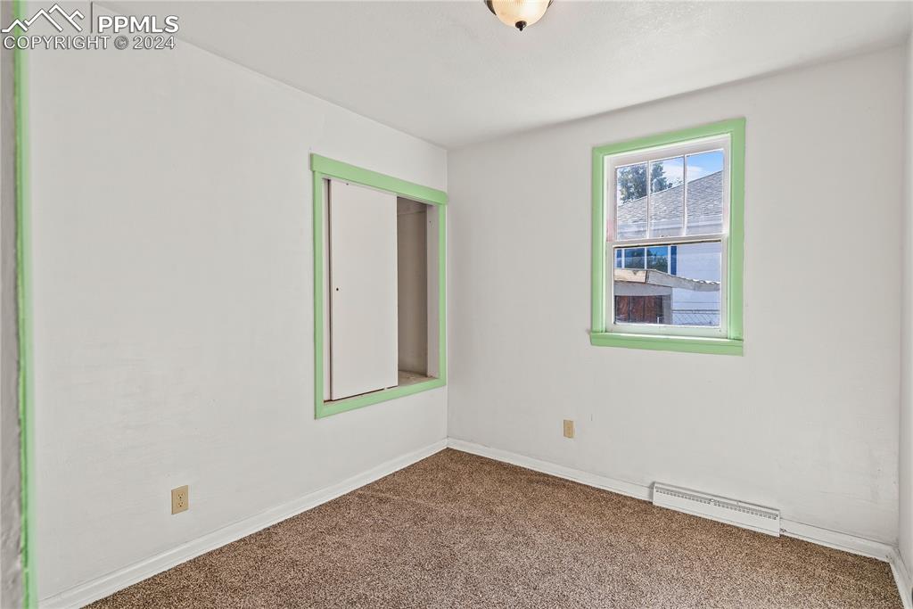 621 Edison Avenue La Junta, CO 81050 - Photo 16 of 30 an empty room with windows