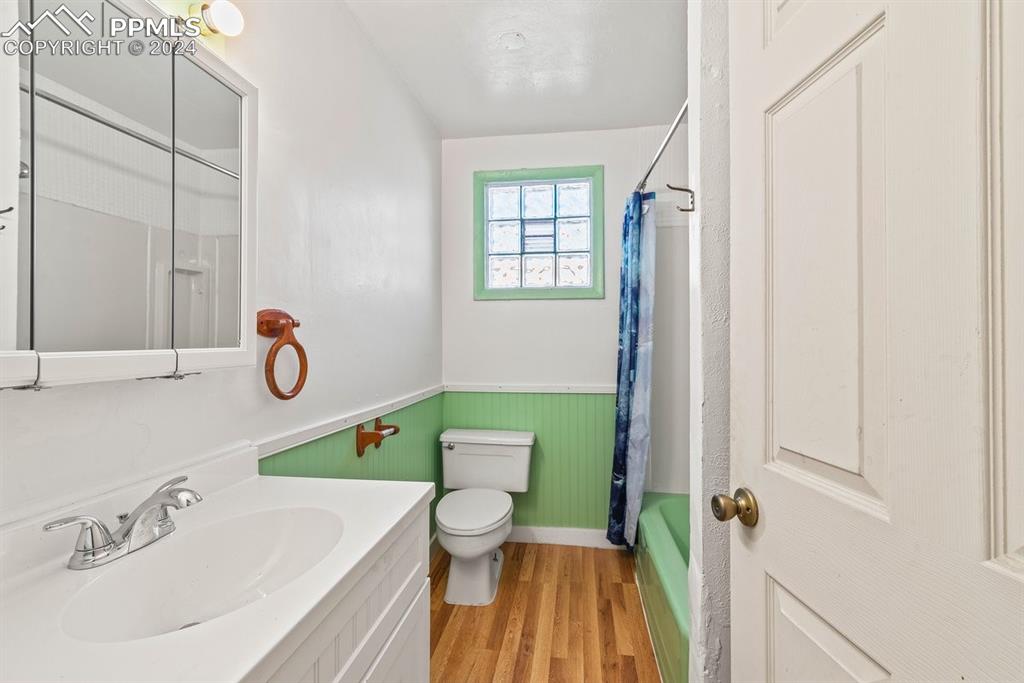 621 Edison Avenue La Junta, CO 81050 - Photo 18 of 30 a bathroom with a sink a toilet and shower