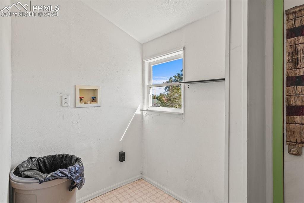 621 Edison Avenue La Junta, CO 81050 - Photo 20 of 30 a bathroom with a sink and a mirror