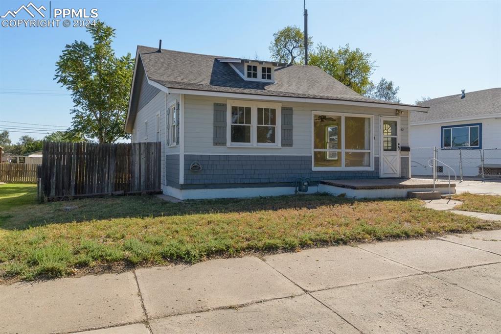 621 Edison Avenue La Junta, CO 81050 - Photo 2 of 30 a front view of a house with a yard