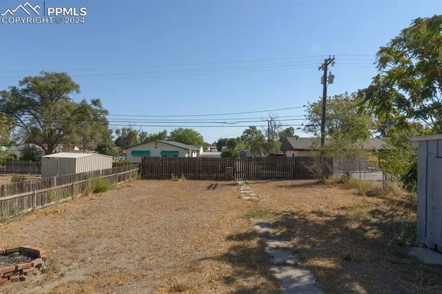 a view of a road with a yard
