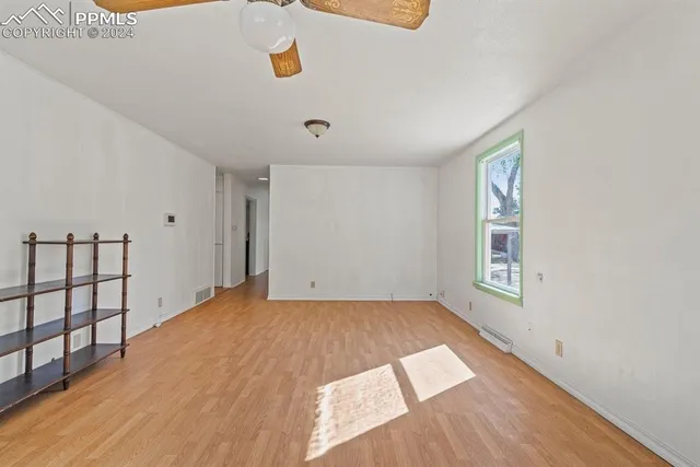 a view of empty room with windows