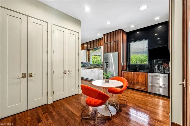 a outdoor space with furniture and wooden floor