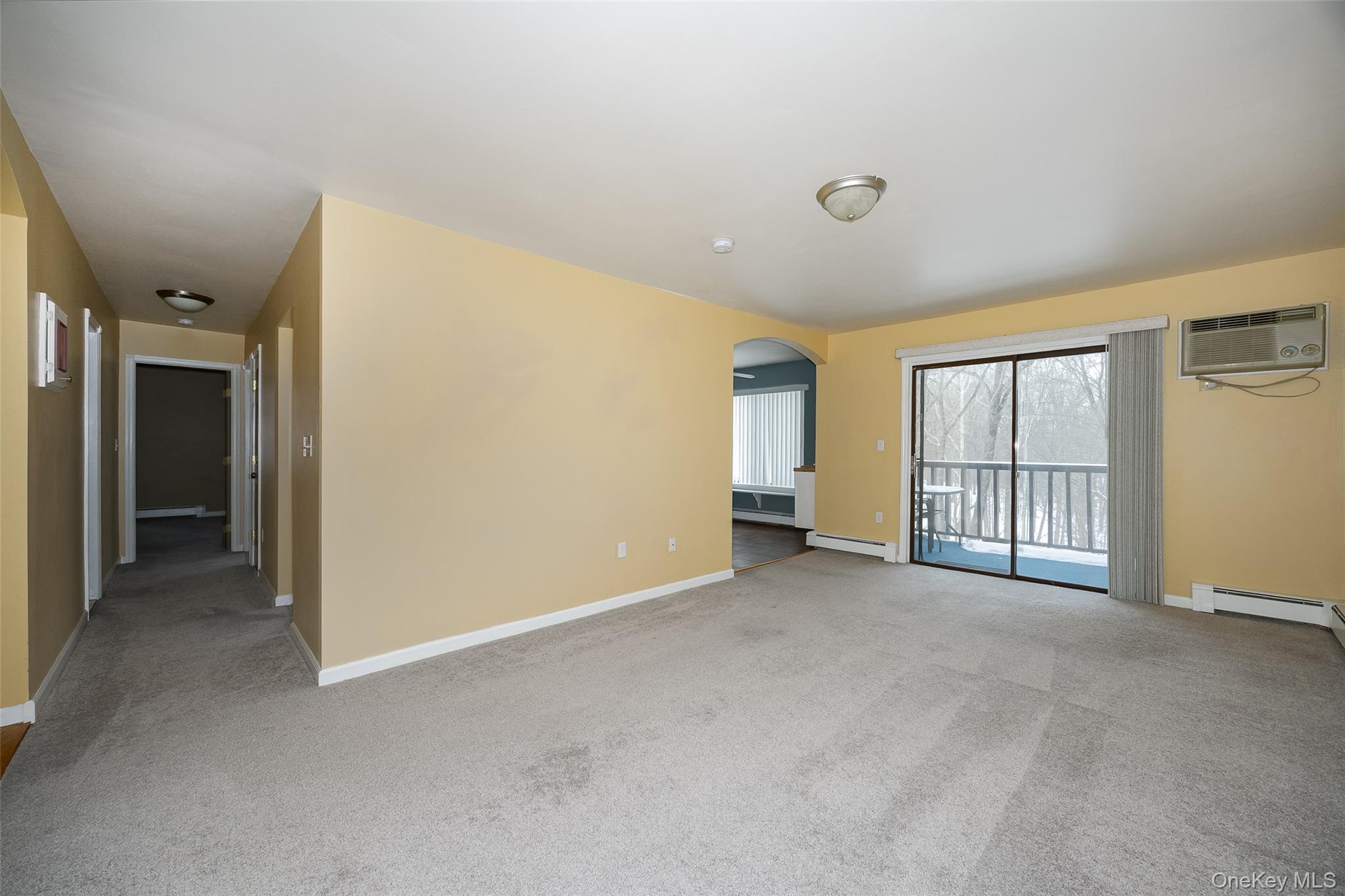 3 Hook Road, Unit 72H Poughkeepsie, NY 12601 - Photo 2 of 23 Large living room with access to the balcony.