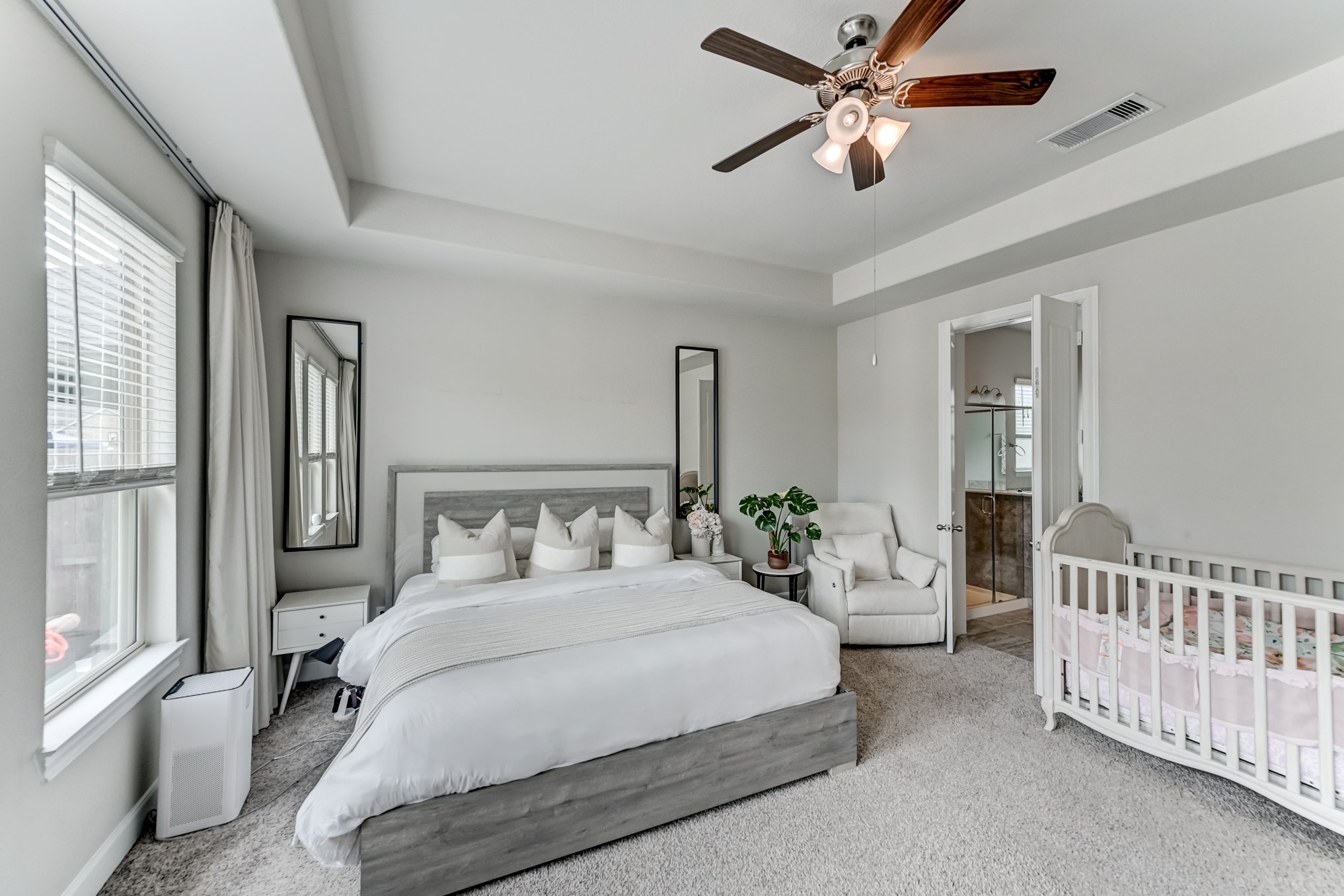 5806 Metaphor Way Rosenberg, TX 77469 - Photo 22 of 50 a bedroom with a bed and a large window