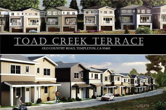 a front view of a residential apartment building with a yard